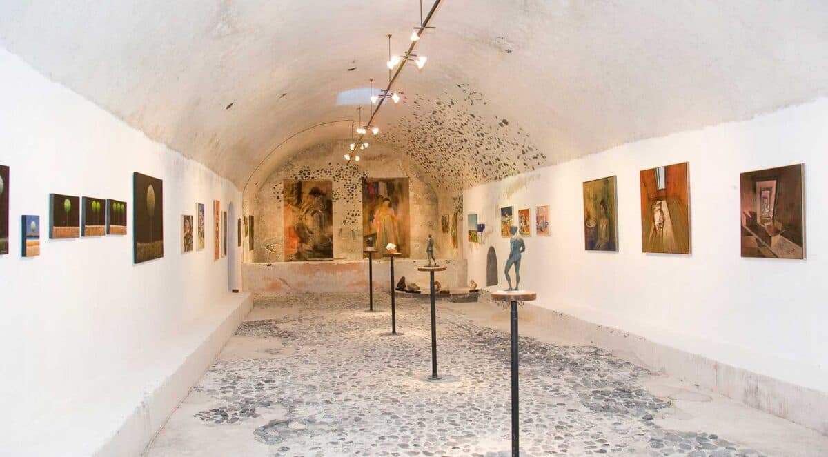 Art Space Art Gallery - Winery - Museum with paintings, sculptures, and historic stone walls.