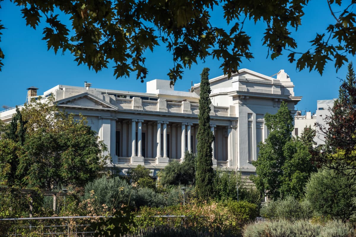 Benaki Museum Athens with classical architecture, white facade, lush greenery, and Greek cultural heritage.