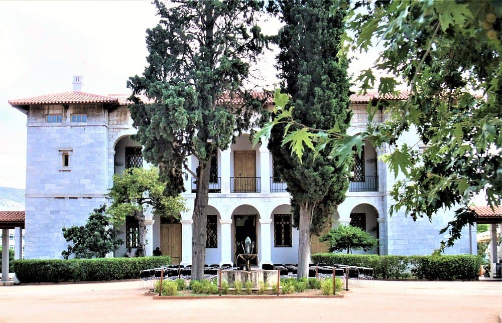 Byzantine and Christian Museum building with Mediterranean-style architecture, lush garden, fountain, and elegant outdoor spaces.
