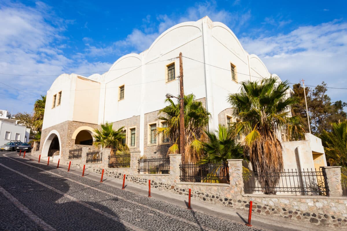Prehistoric Thera Museum in Fira, Santorini featuring traditional Cycladic architecture and archaeological exhibits.